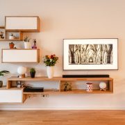 white wooden wall mounted shelf with white wooden frame